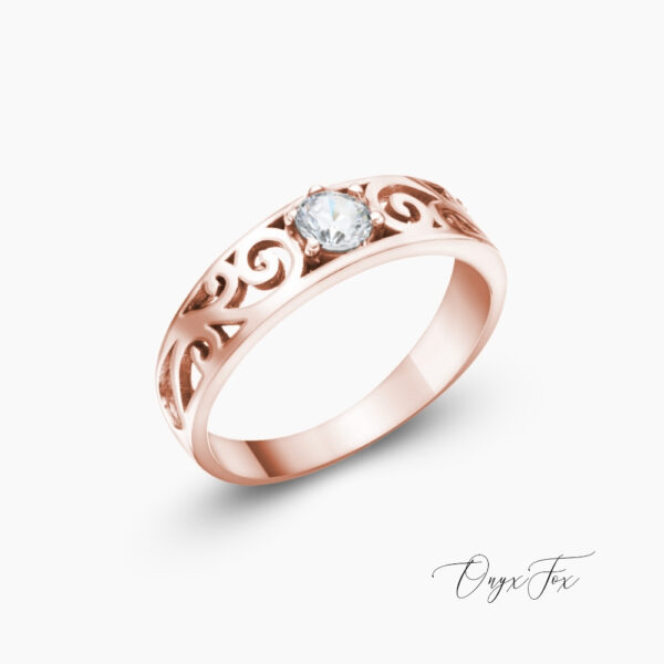 Demeter prsten růžové zlato onyx fox z úhlu